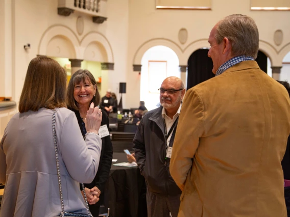Nancy Johnson talks with Jennifer Smith and others