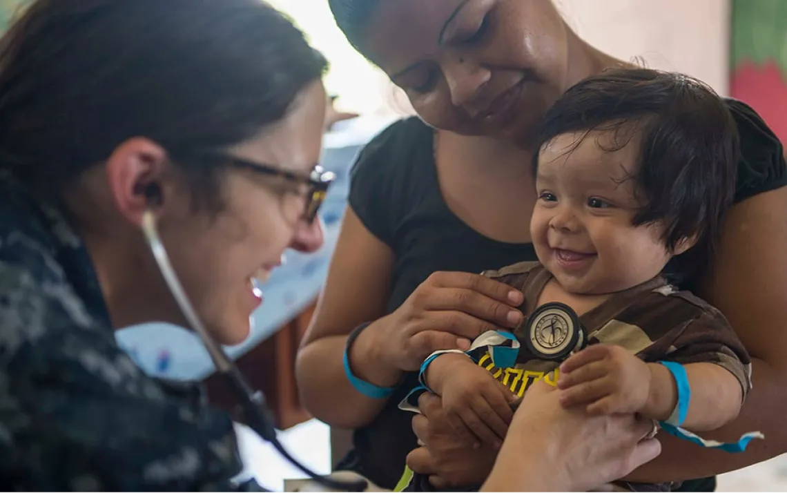 Checking the vitals of a baby