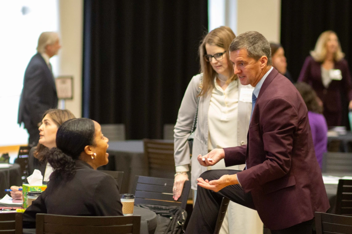 James G. Hodge talks with audience