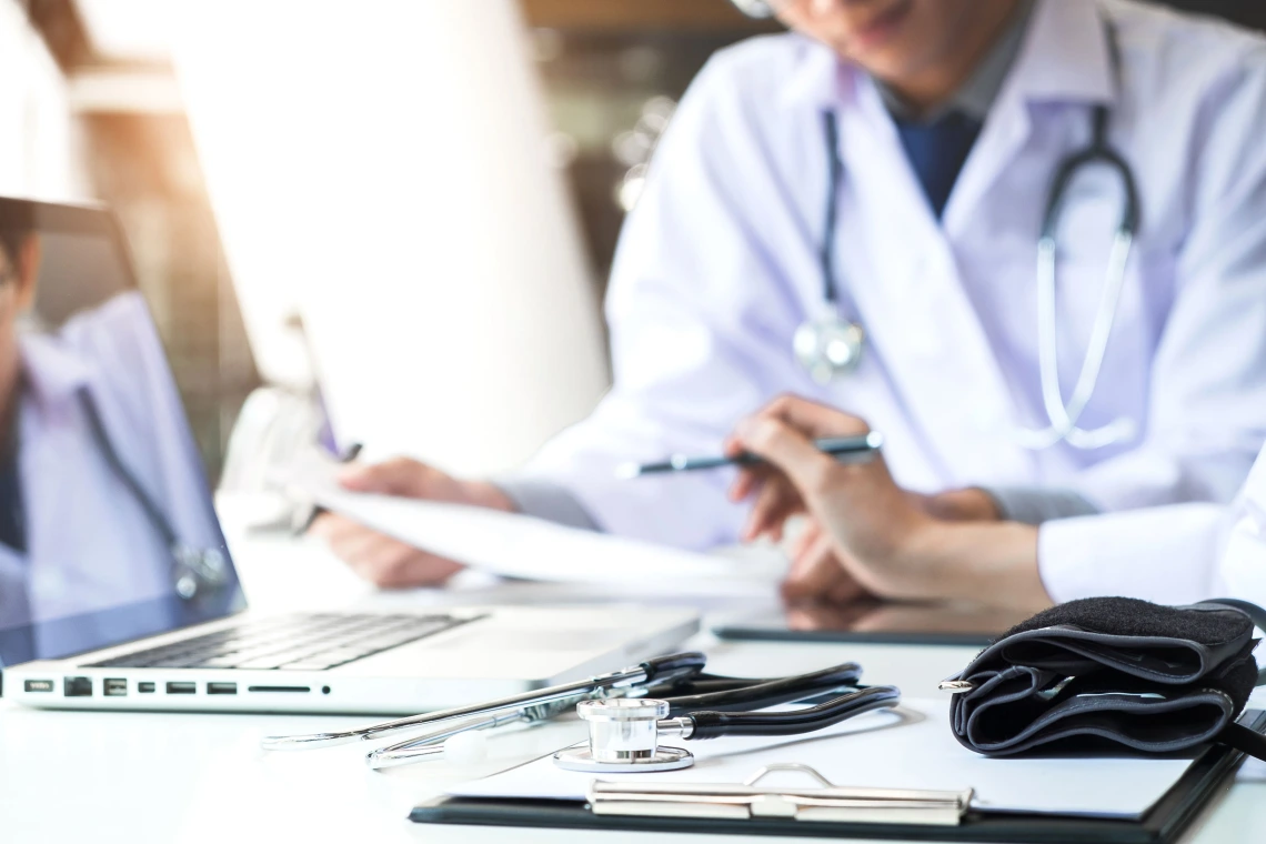 doctor with bills